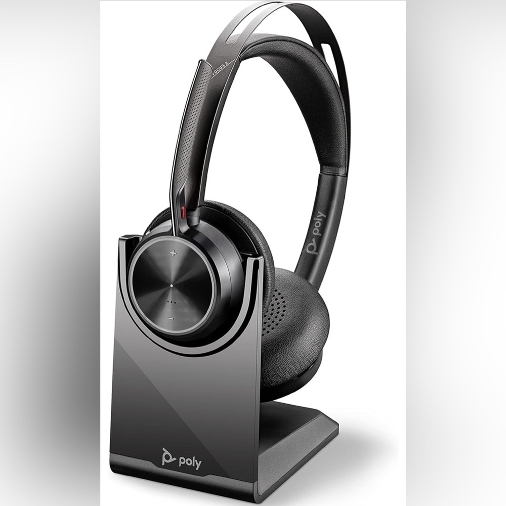 Gently used Poly Voyager Focus 2 Bluetooth Headset with Stand. Comfortable AF